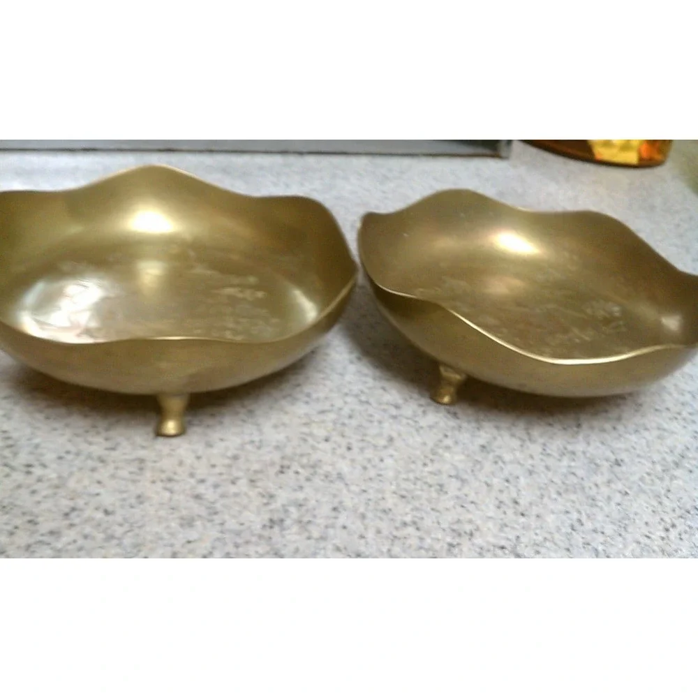 Set of 2 brass bowls with oriental design etchings